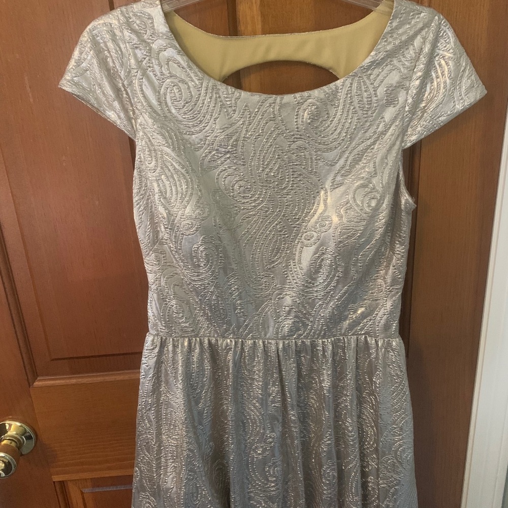 Gold cocktail dress with cute back!